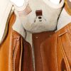 Dooney & Bourke All Weather Leather bone and British tan pebbled leather buckle crossbody satchel