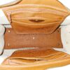 Dooney & Bourke All Weather Leather bone and British tan pebbled leather buckle crossbody satchel